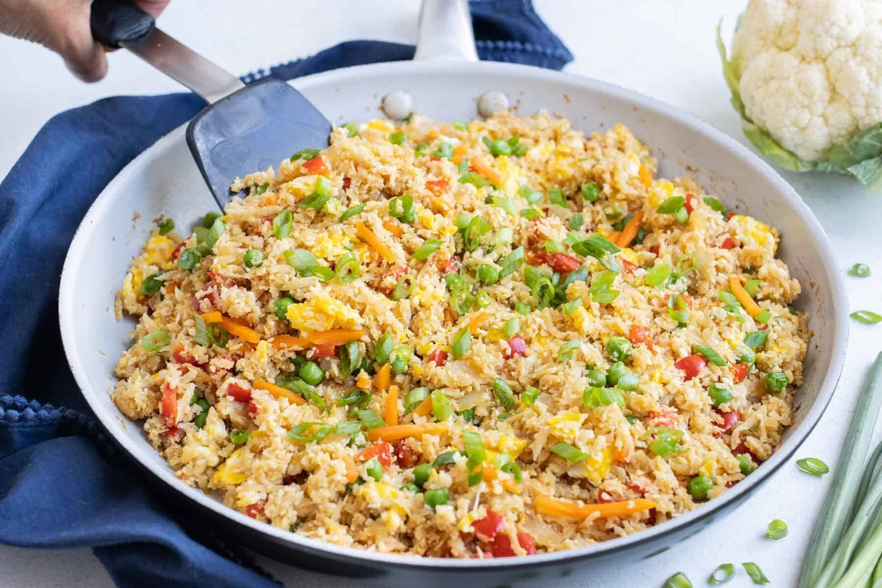 Cauliflower Fried Rice Recipe (Not Soggy!) - Evolving Table