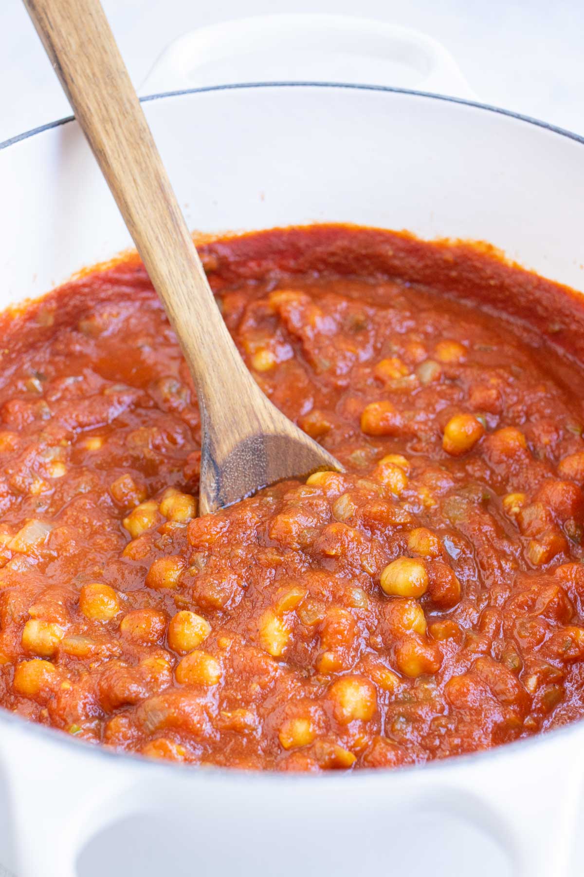 Chana masala is simmered for extra flavor.