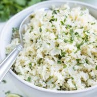 Cauliflower rice is perfectly seasoned with cilantro and lime.