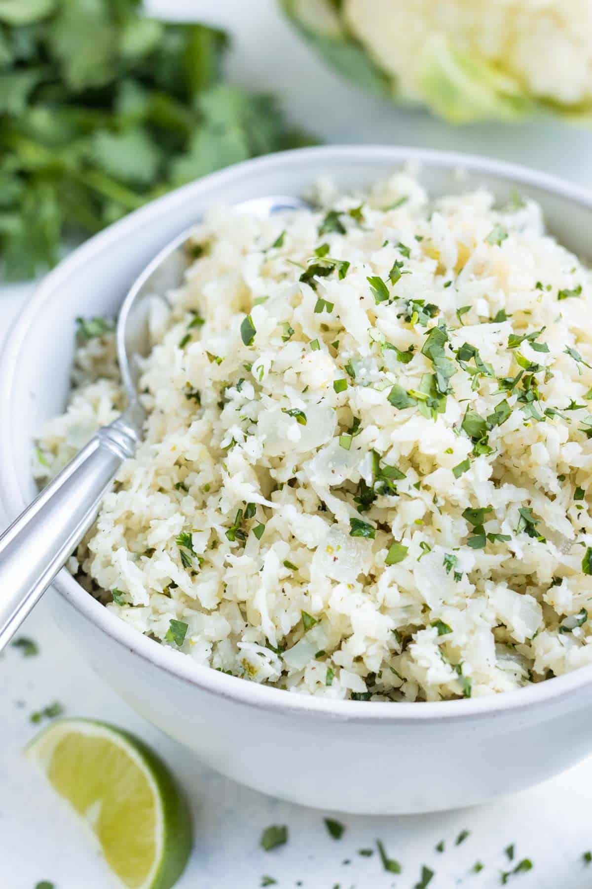 Cauliflower rice is perfectly seasoned with cilantro and lime.