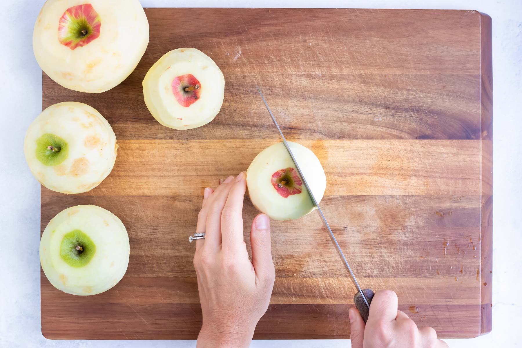Core the apples with this easy method before dicing and placing in the instant pot.