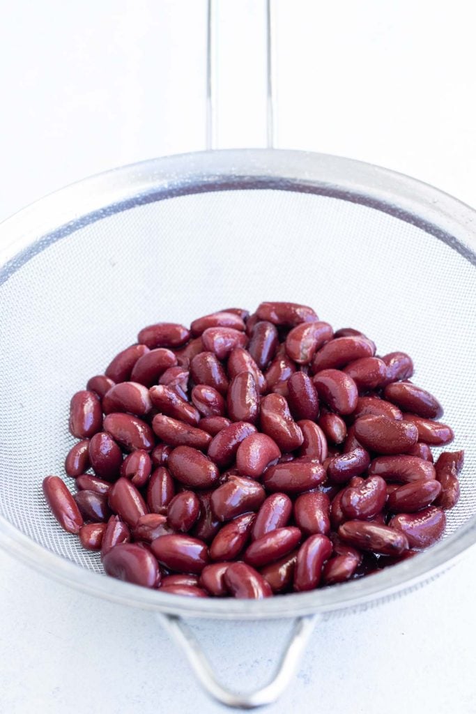 Red kidney beans rinsed and drained in a colander for easy Instant Pot chili.