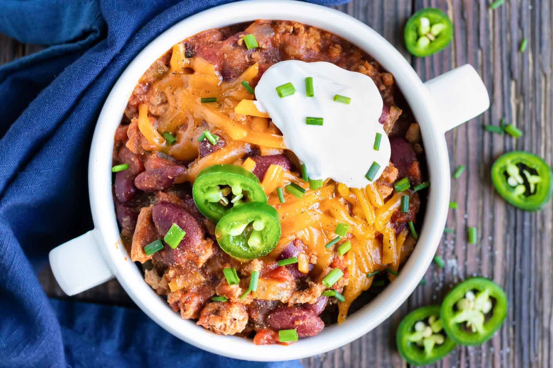 A big bowl of pressure cooker turkey chili made with ground turkey and kidney beans.