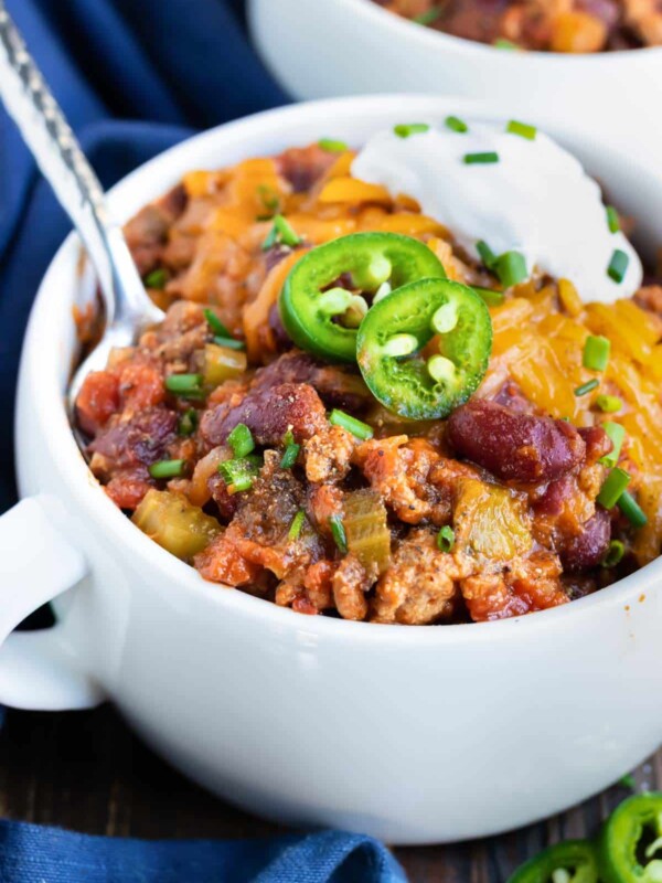 A spoon scooping out a bite of an Instant Pot Turkey Chili recipe.