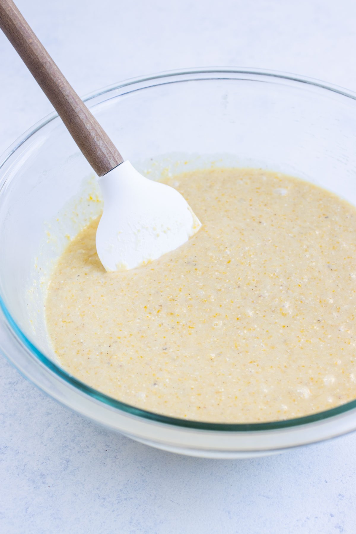 A bowl full of cornbread batter.