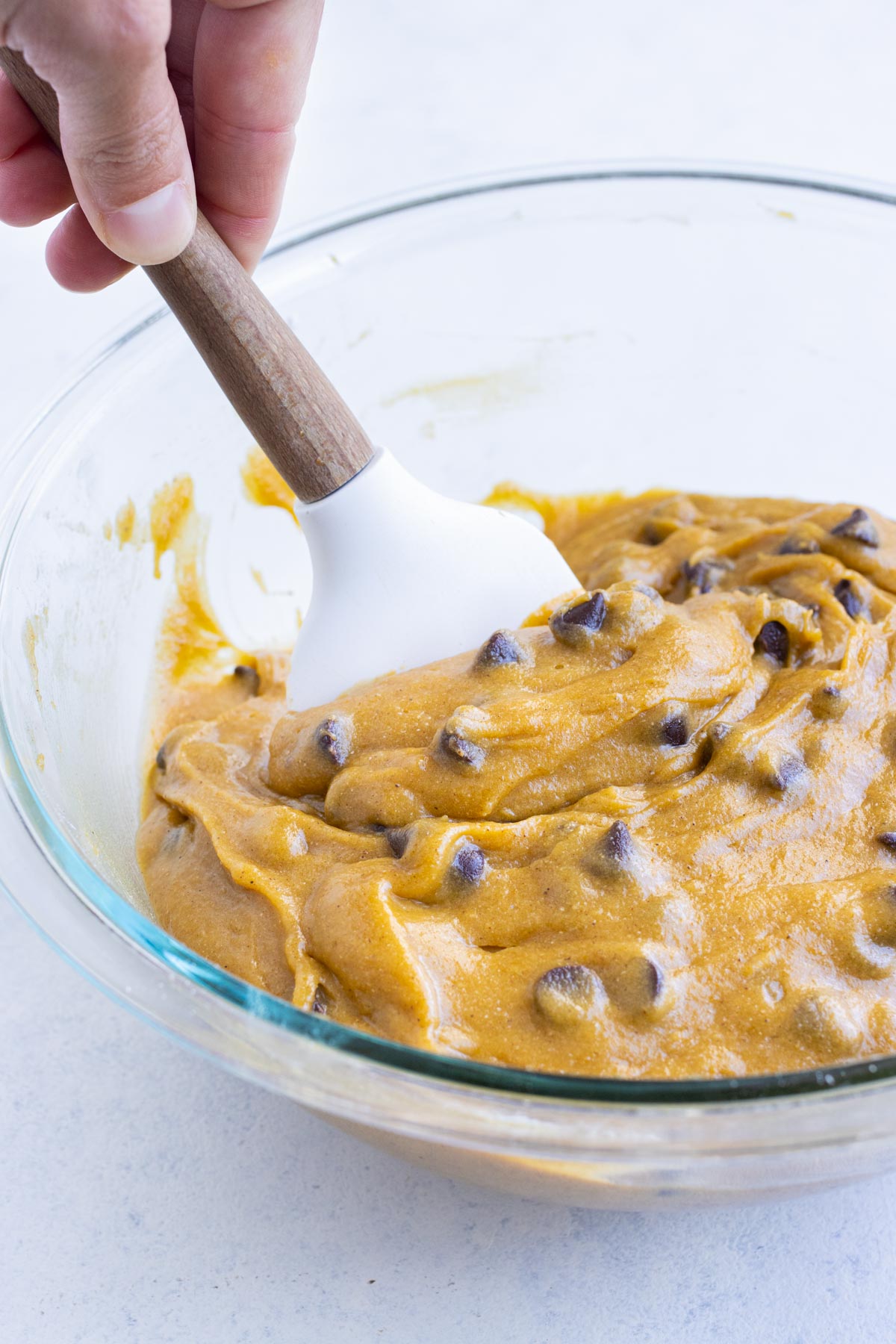 Chocolate chips are added to the batter.