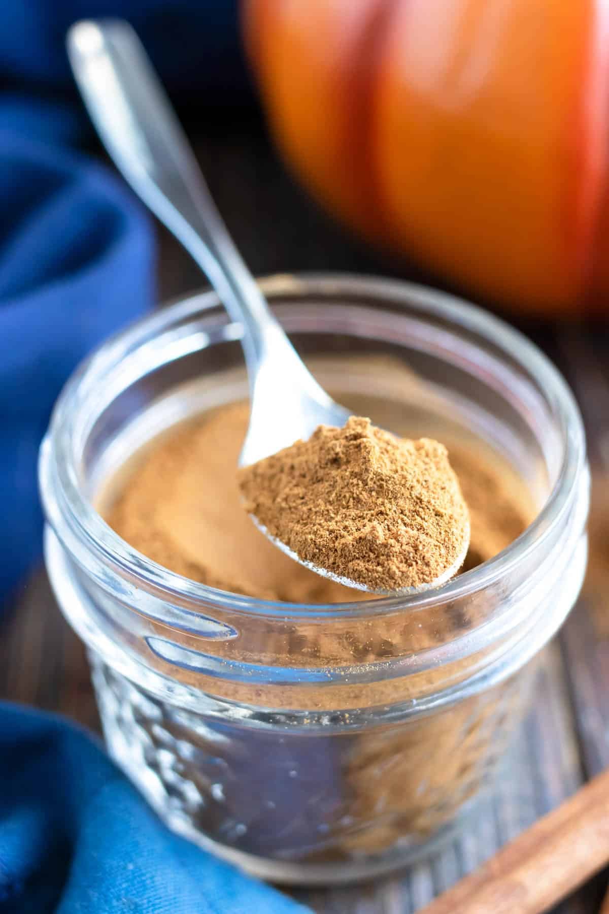 A silver spoon full of an easy pumpkin spice recipe.