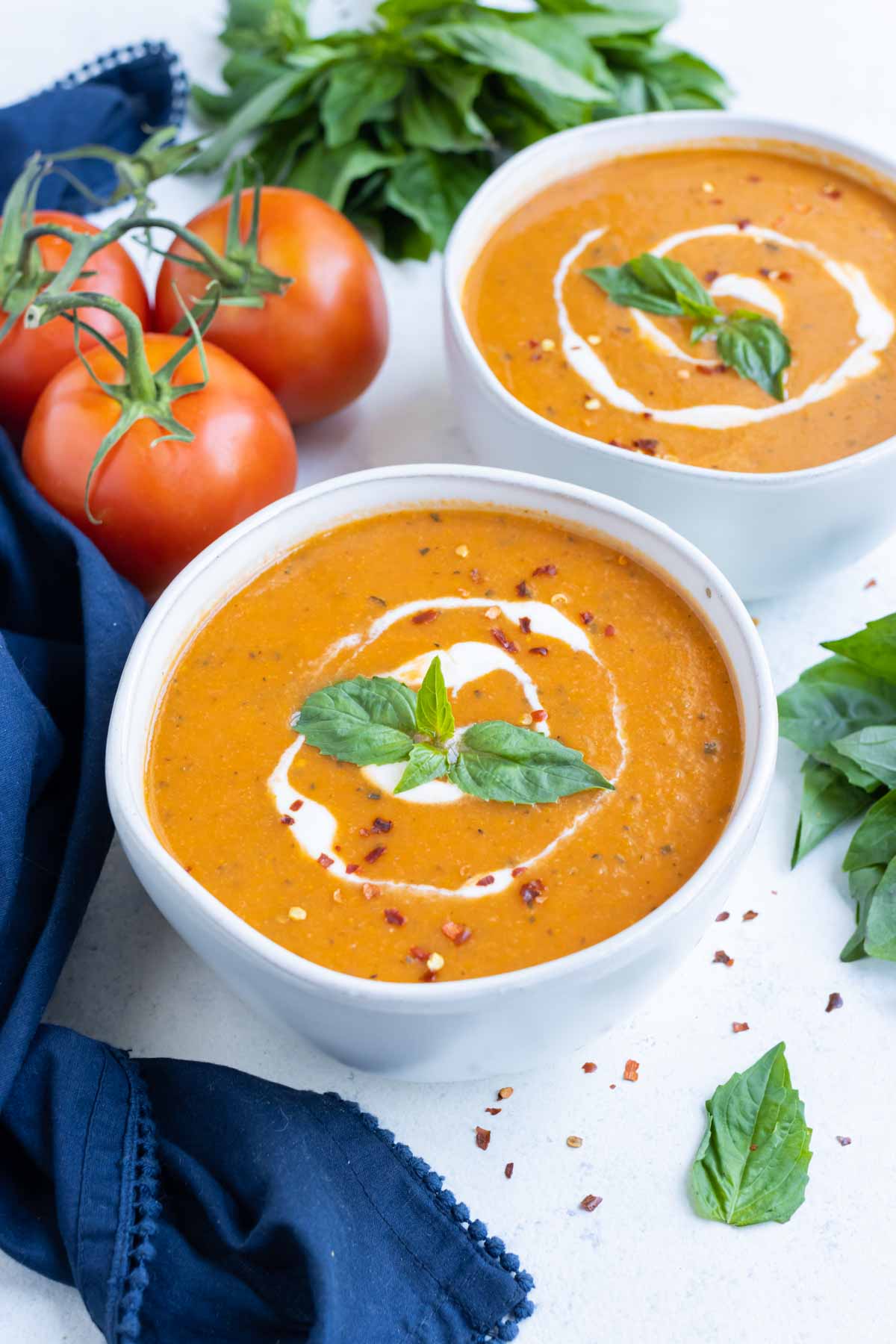Healthy and savory tomato basil bisque is the perfect fall meal.