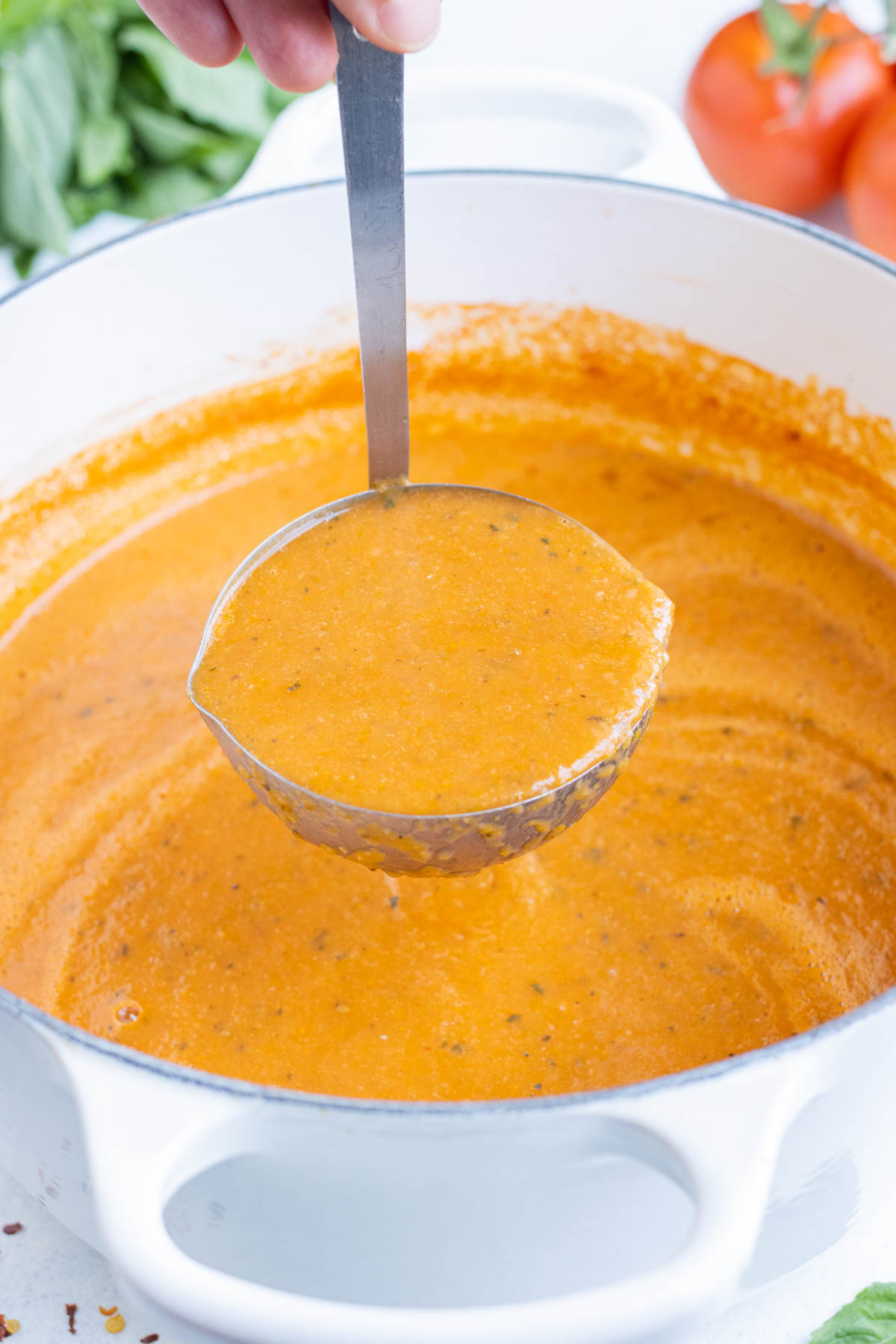 Creamy tomato basil bisque is a hearty fall dish.
