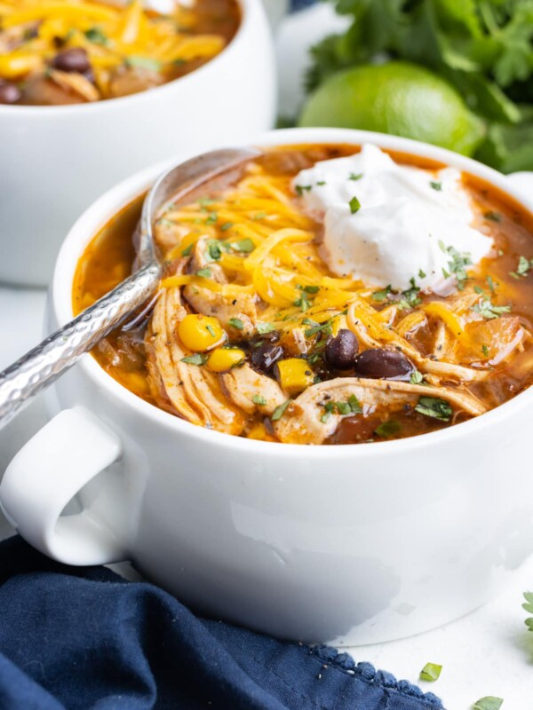 Sour cream and cheese are the perfect toppings for chicken taco soup.