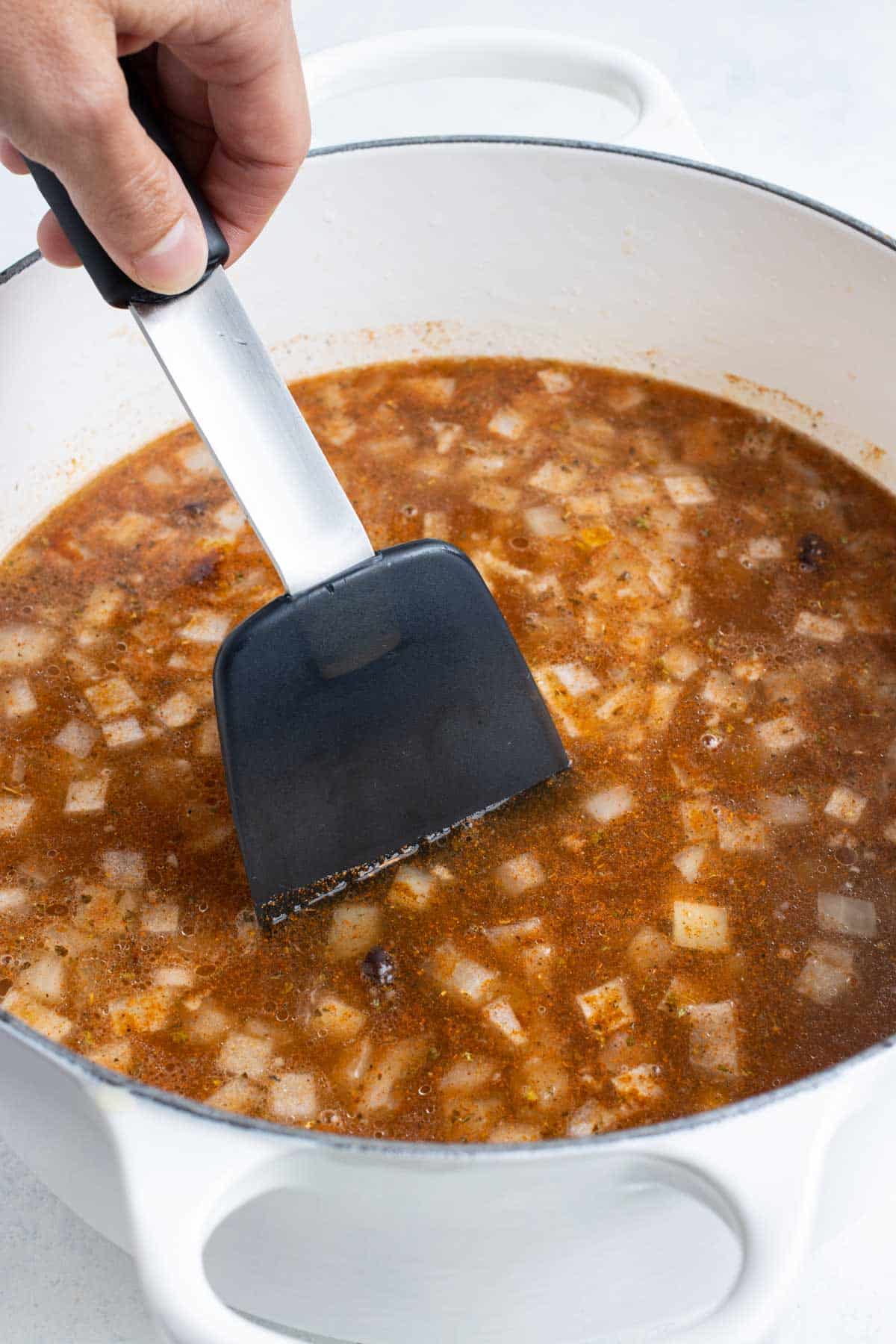 Taco seasoning is added to the soup base.