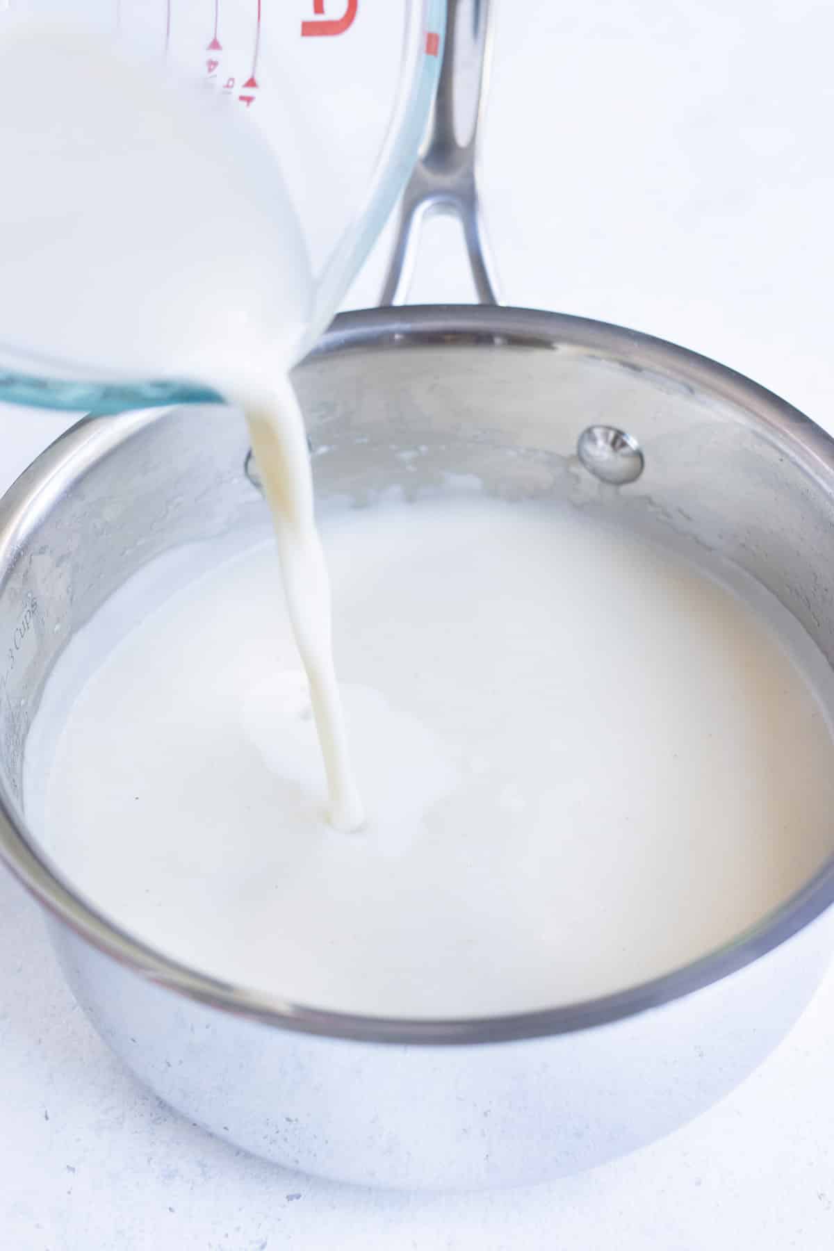 Milk is added to the gravy mixture.