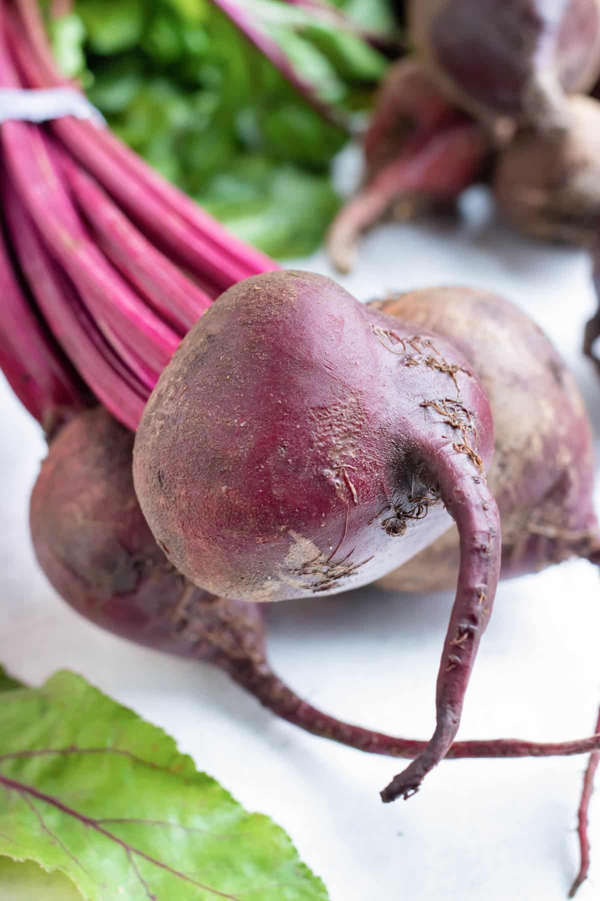 Learn how to boil whole beets for salad or soup recipes.