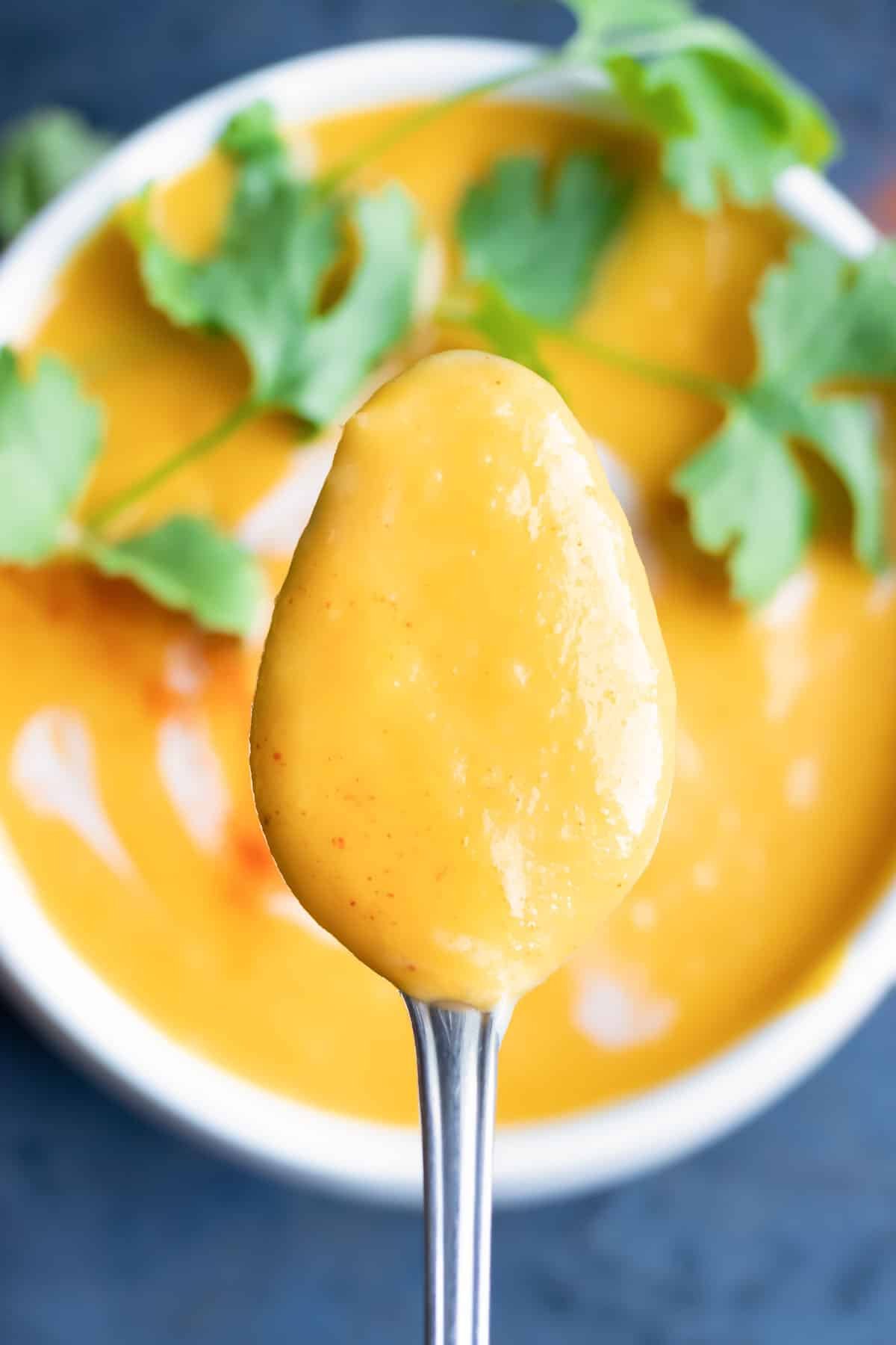 A spoonful of savory soup.