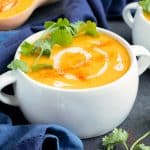 A bowl of roasted butternut squash soup with coconut milk.