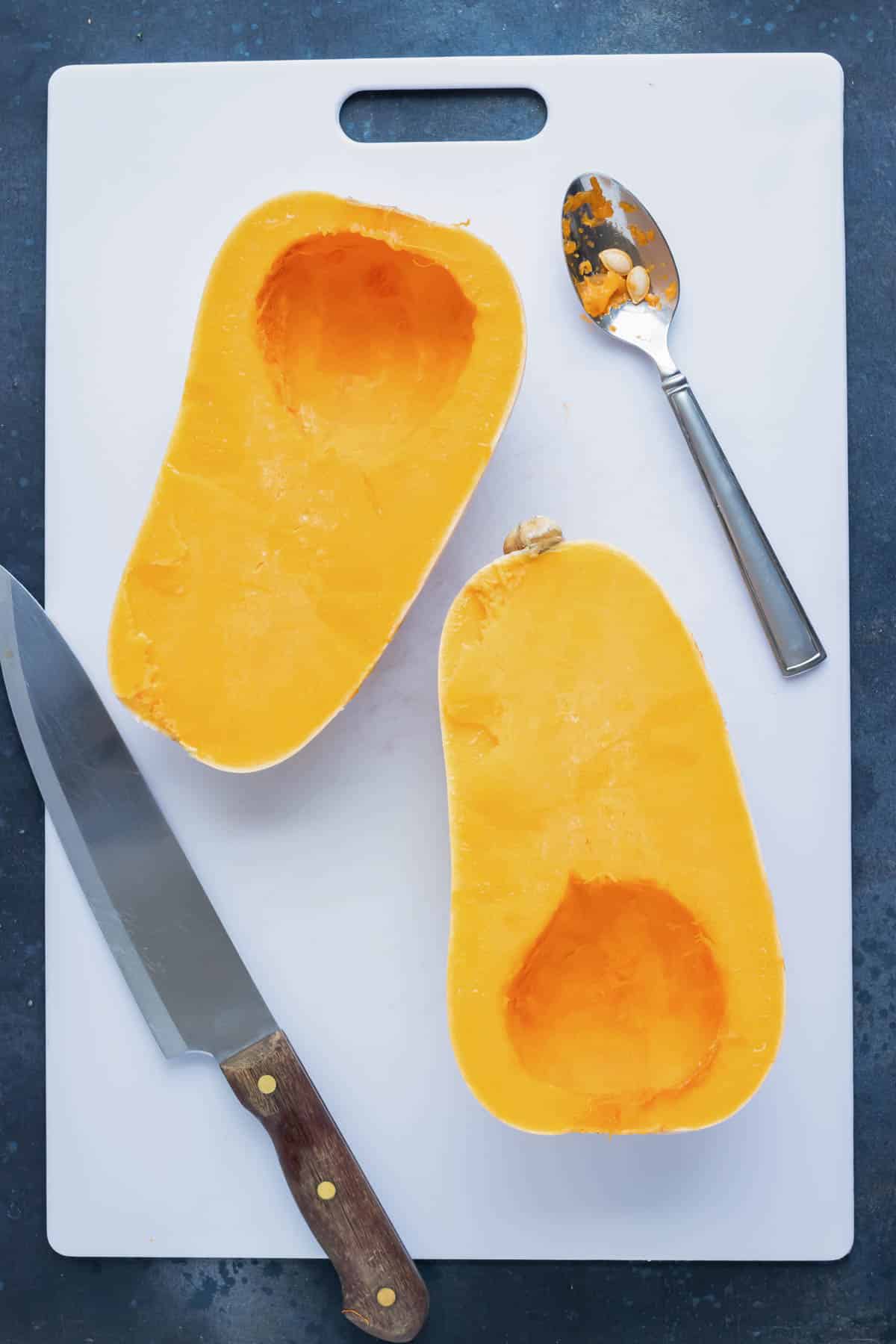 How to cut a butternut squash in half and remove the seeds.