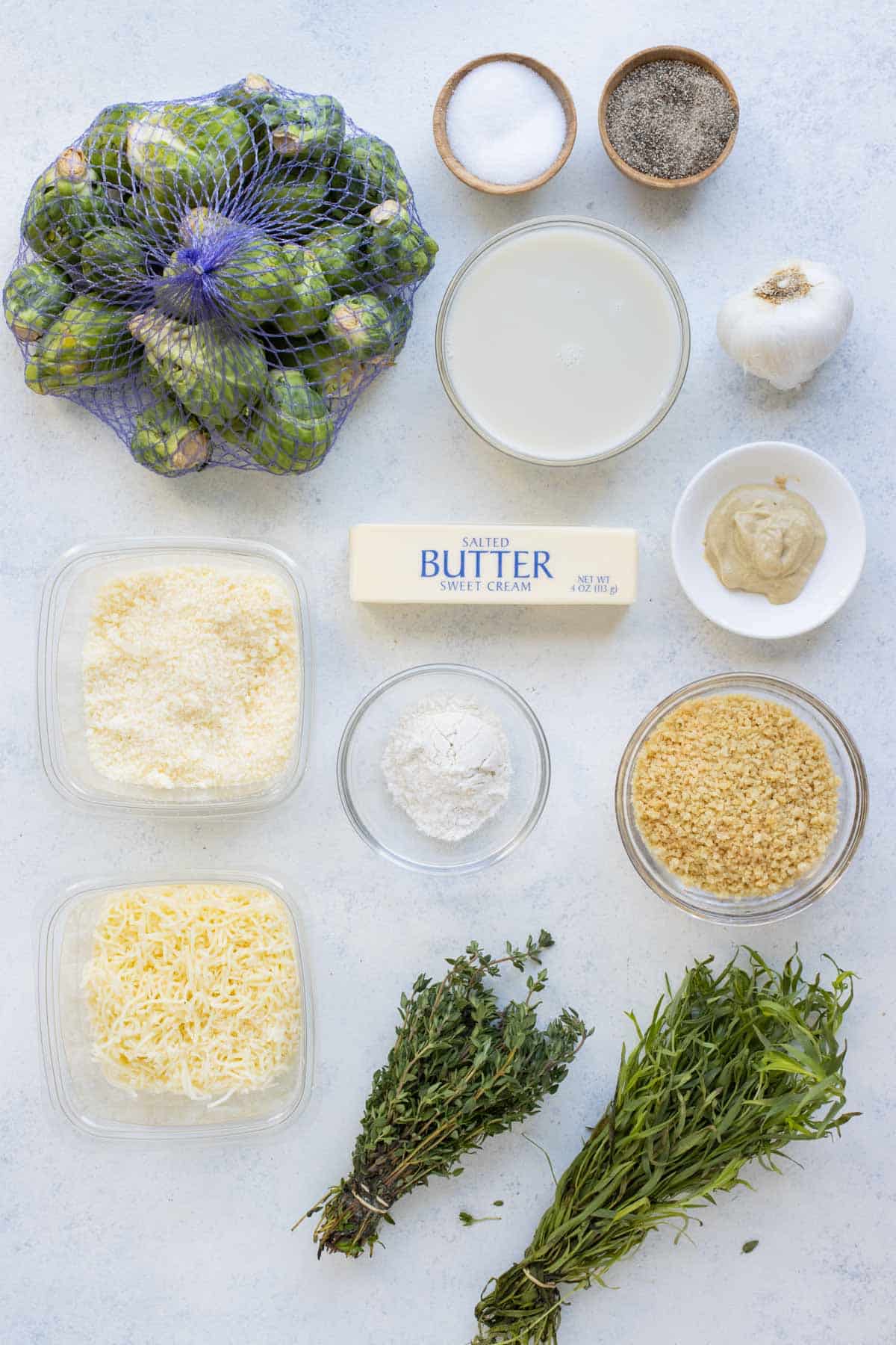 Brussels sprouts, butter, milk, cheese, garlic, breadcrumbs, and herbs are the ingredients for Brussels Sprouts au Gratin.