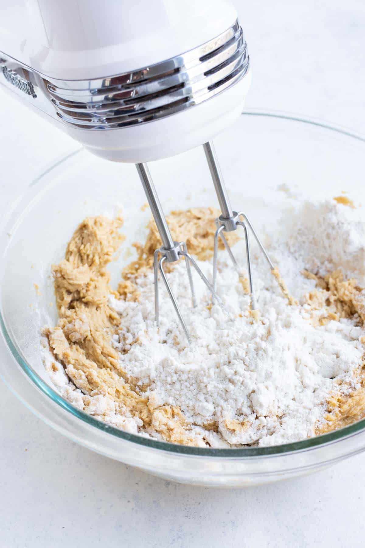 Flour is added into the sugar mixture.