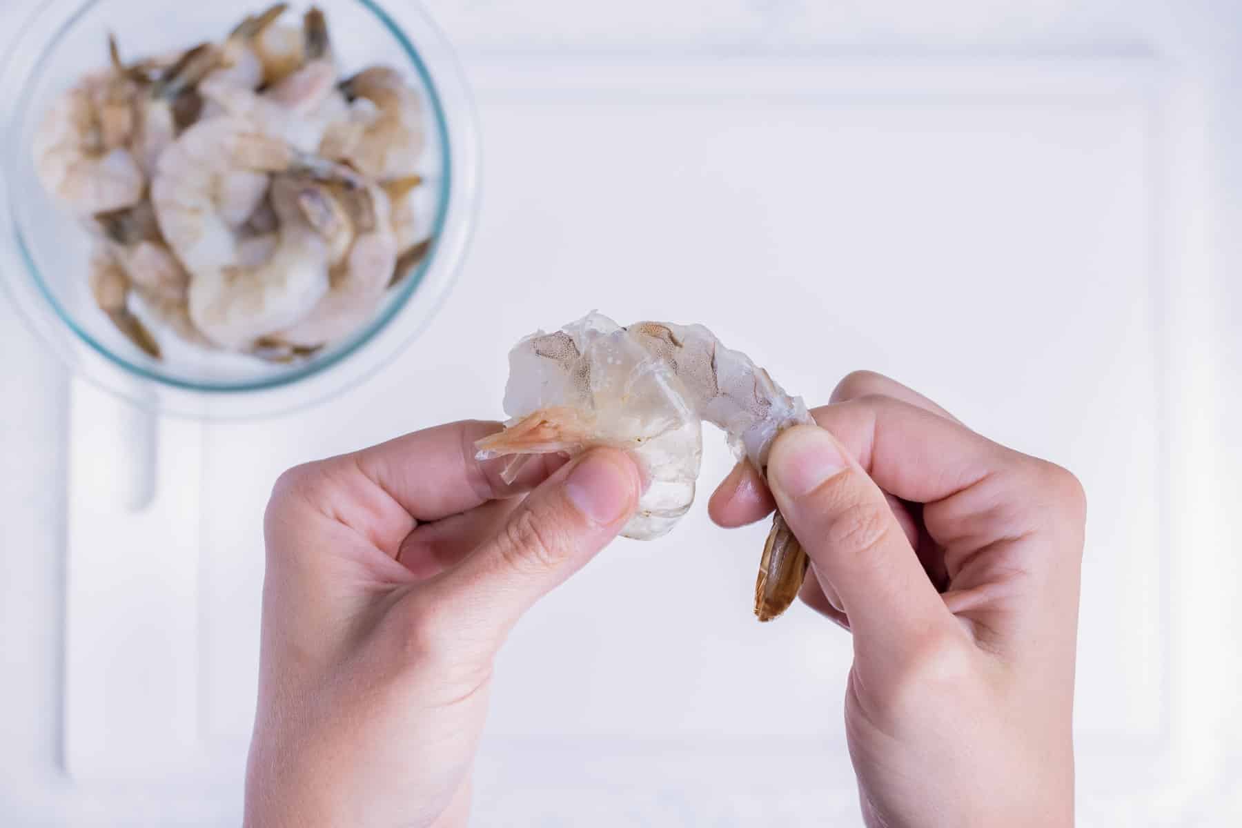 Shrimp are peeled before boiling.