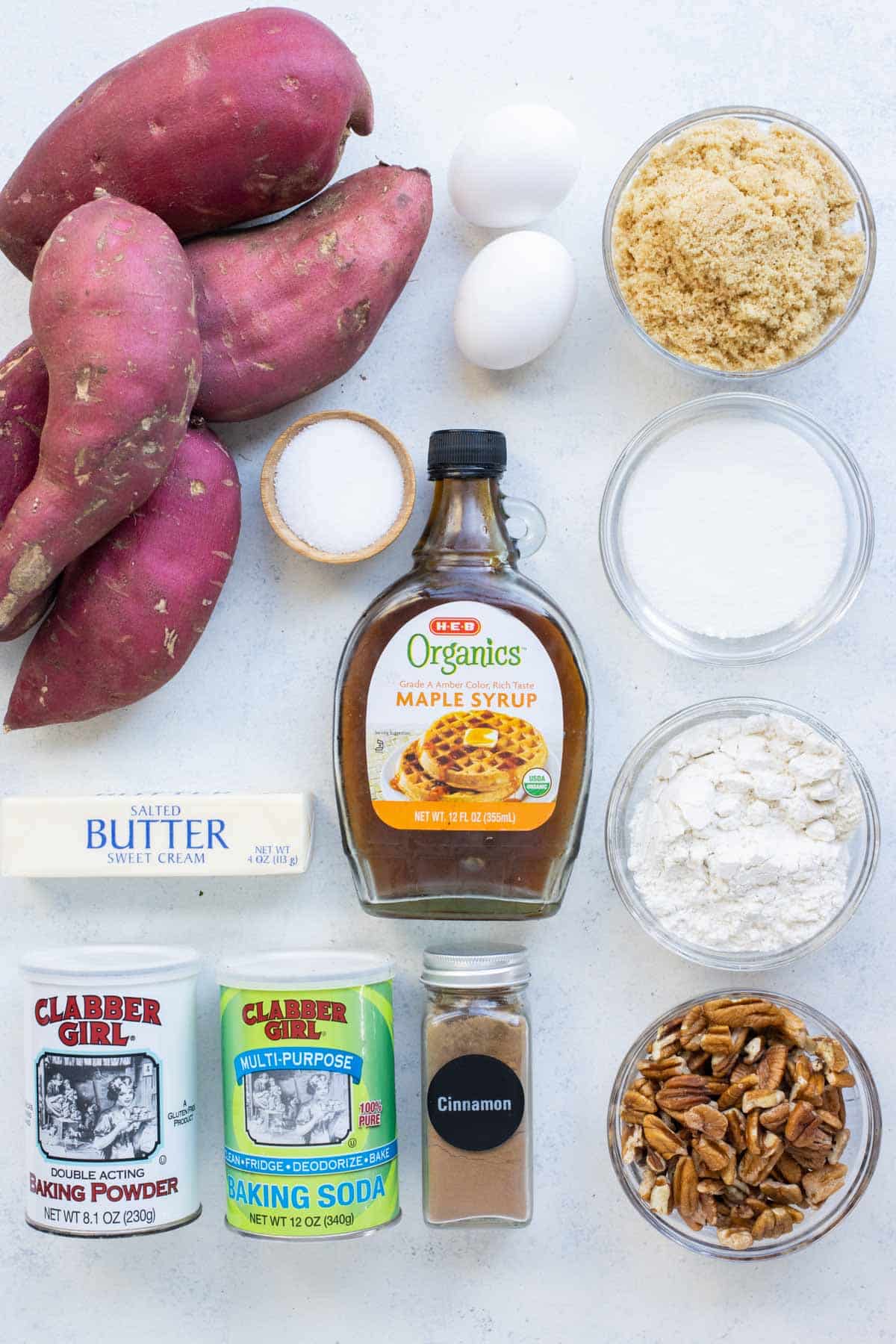 Sweet potatoes, butter, maple syrup, cinnamon, and pecans are the ingredients.
