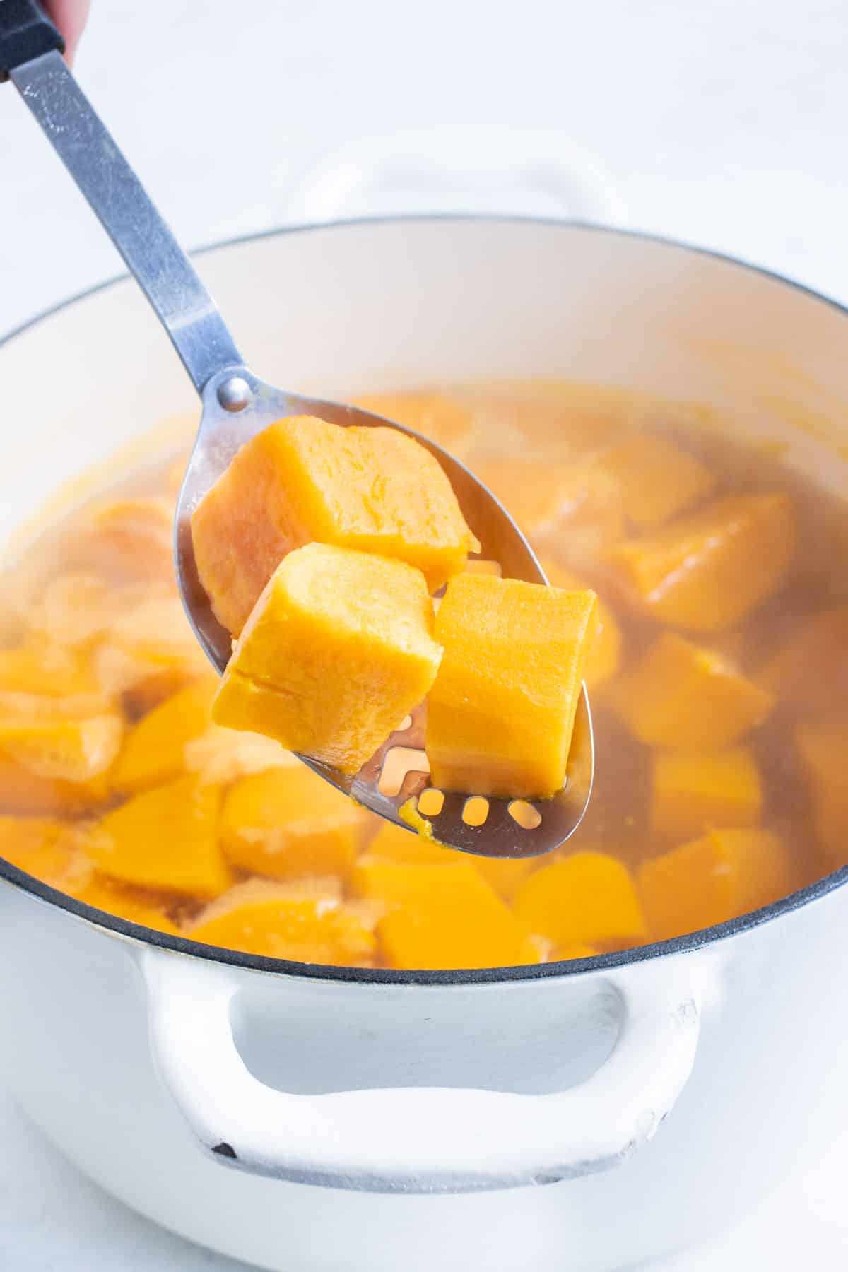 Sweet potatoes are boiled until fork tender.