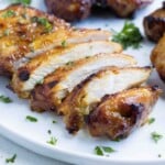 Sliced chicken thighs cooked in the air fryer.