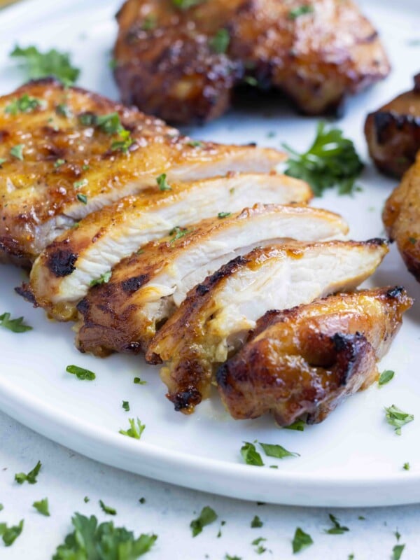 Sliced chicken thighs cooked in the air fryer.