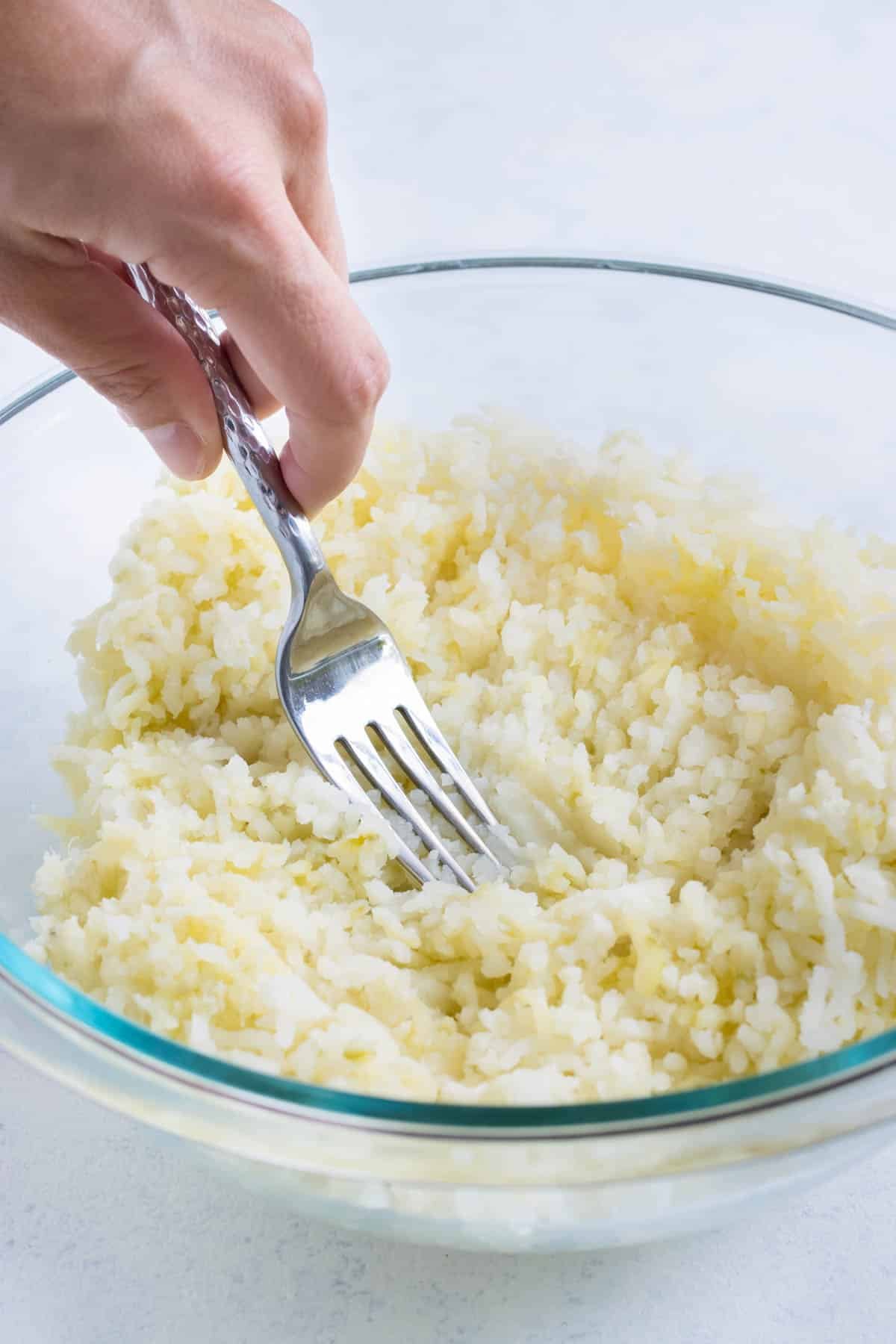 A fork can be used to mash the potatoes.