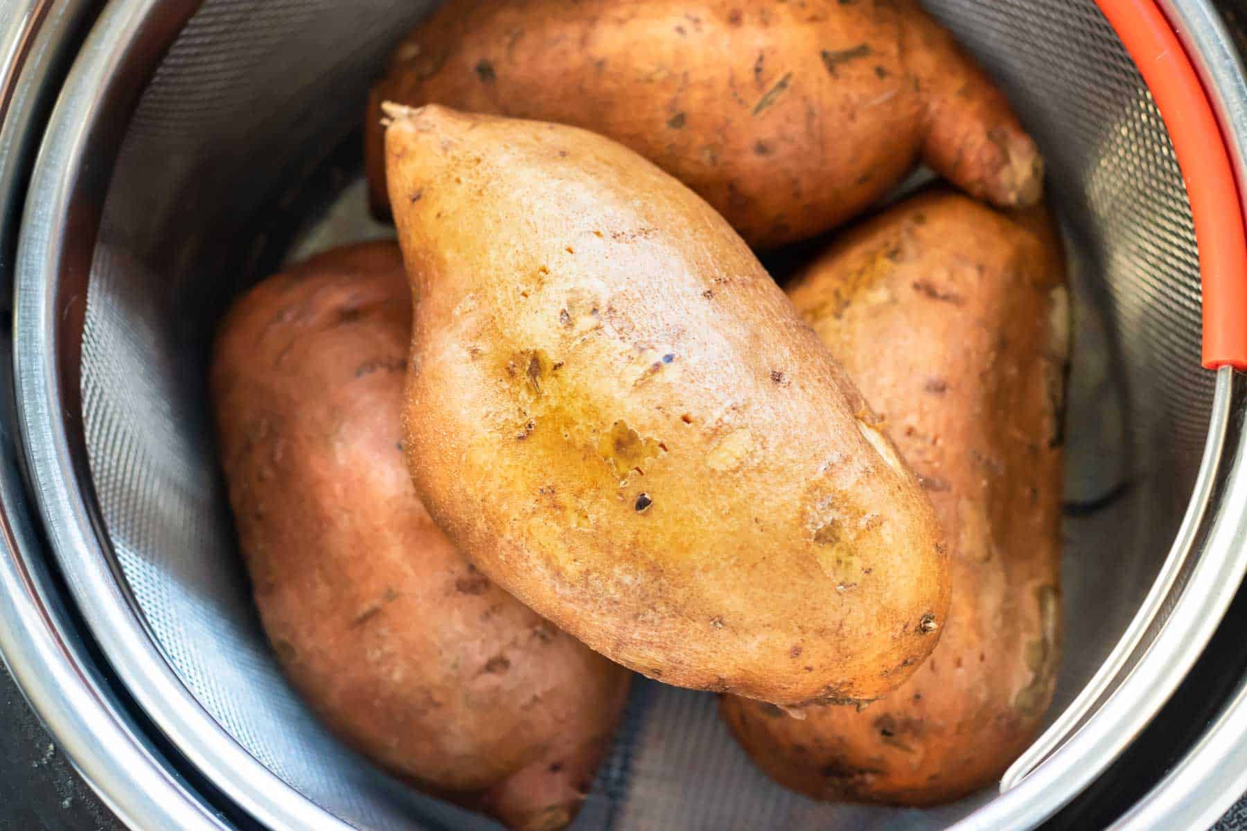 Instant Pot Sweet Potato in a steamer basket.