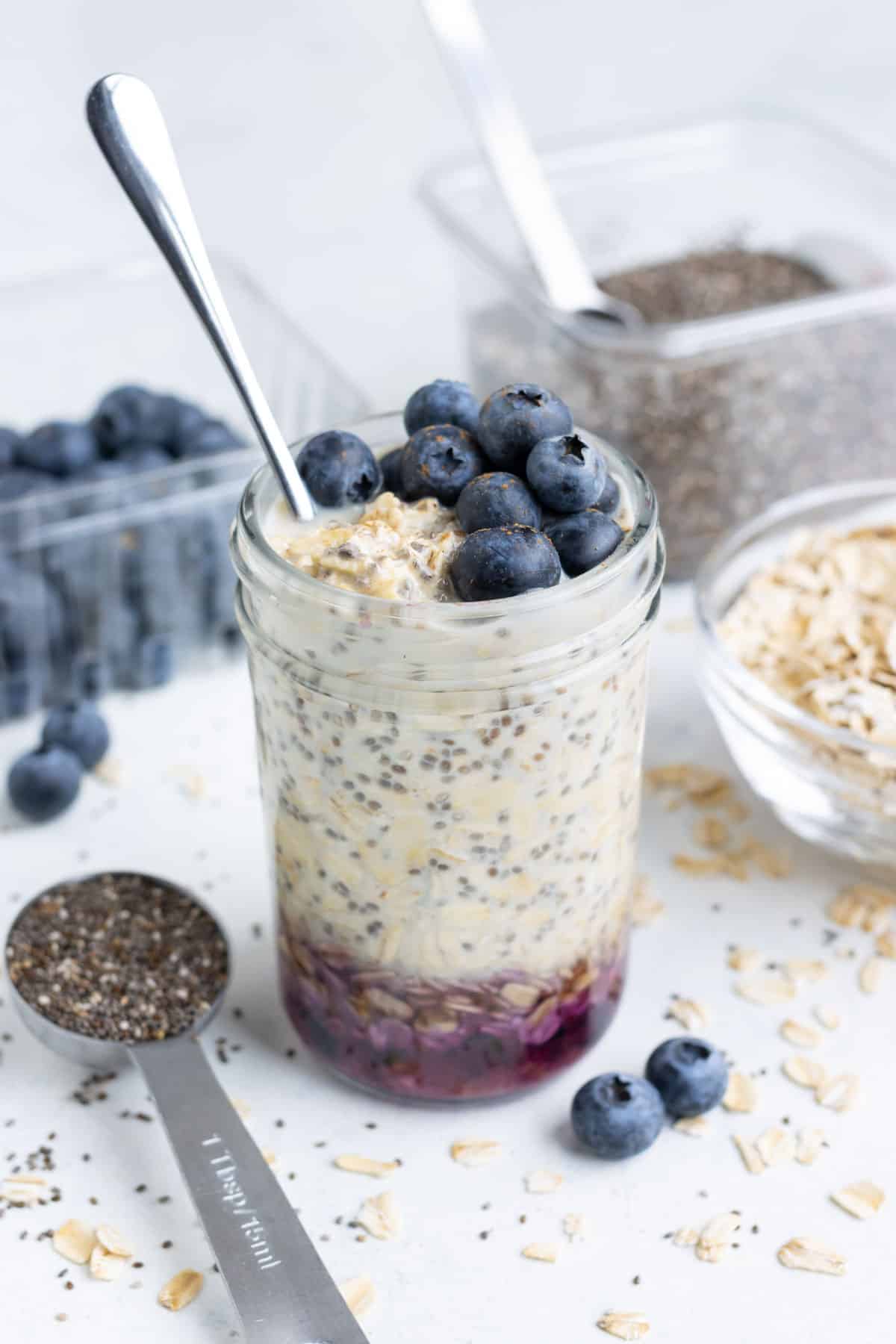 A serving of gluten-free overnight oats with yogurt.