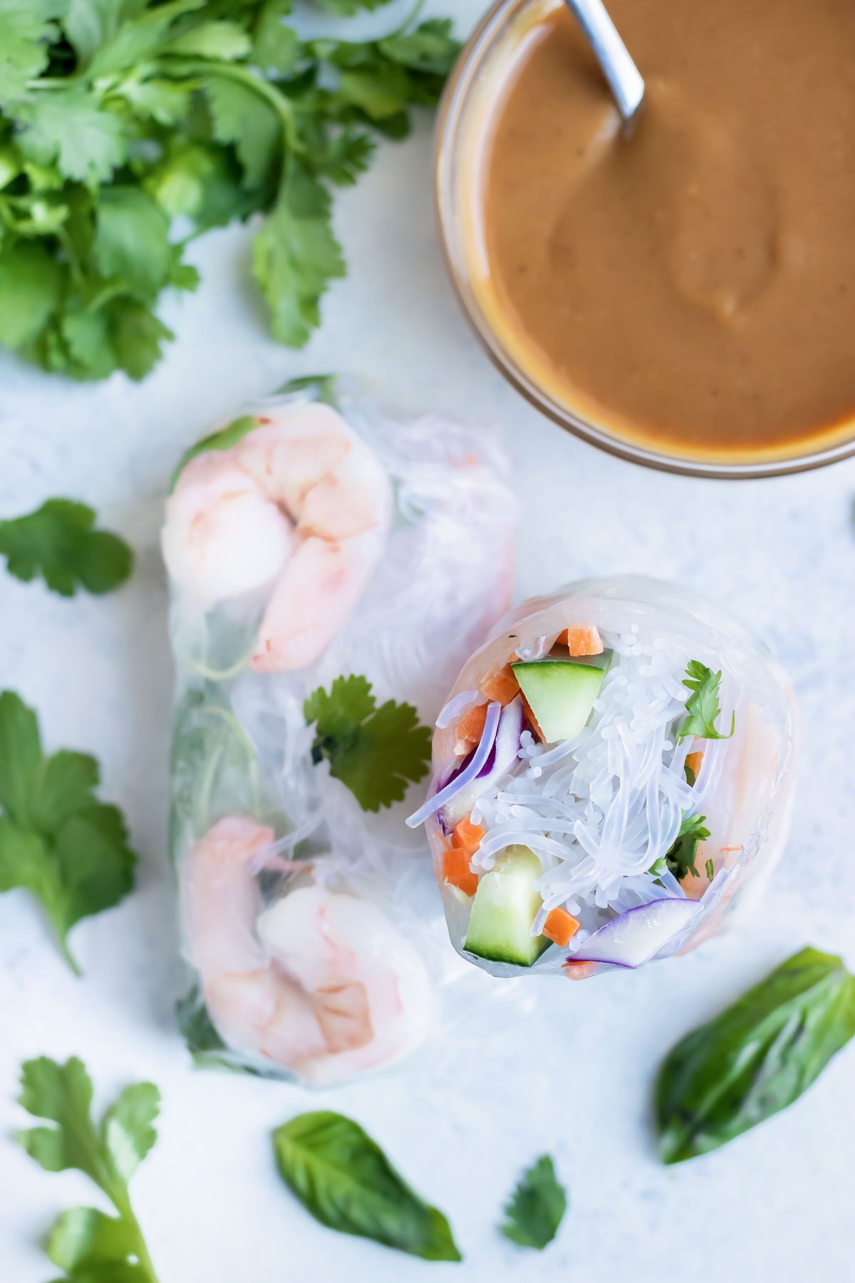 Shrimp and vegetable spring roll is served with a healthy peanut sauce.