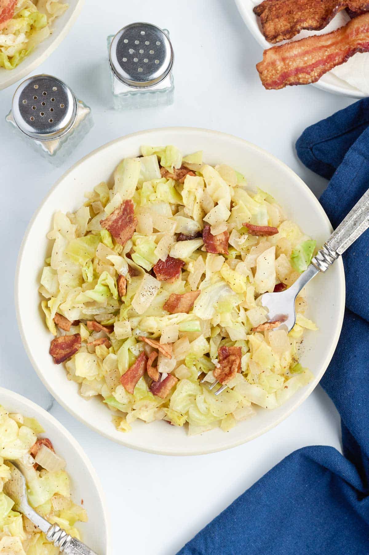 Add bacon to fried cabbage for a flavorful side dish.