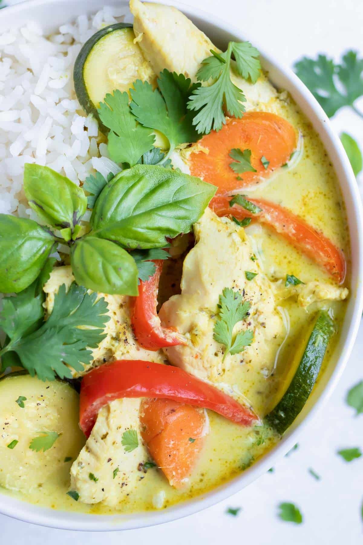 Thai green chicken curry is a quick and easy meal served with rice.