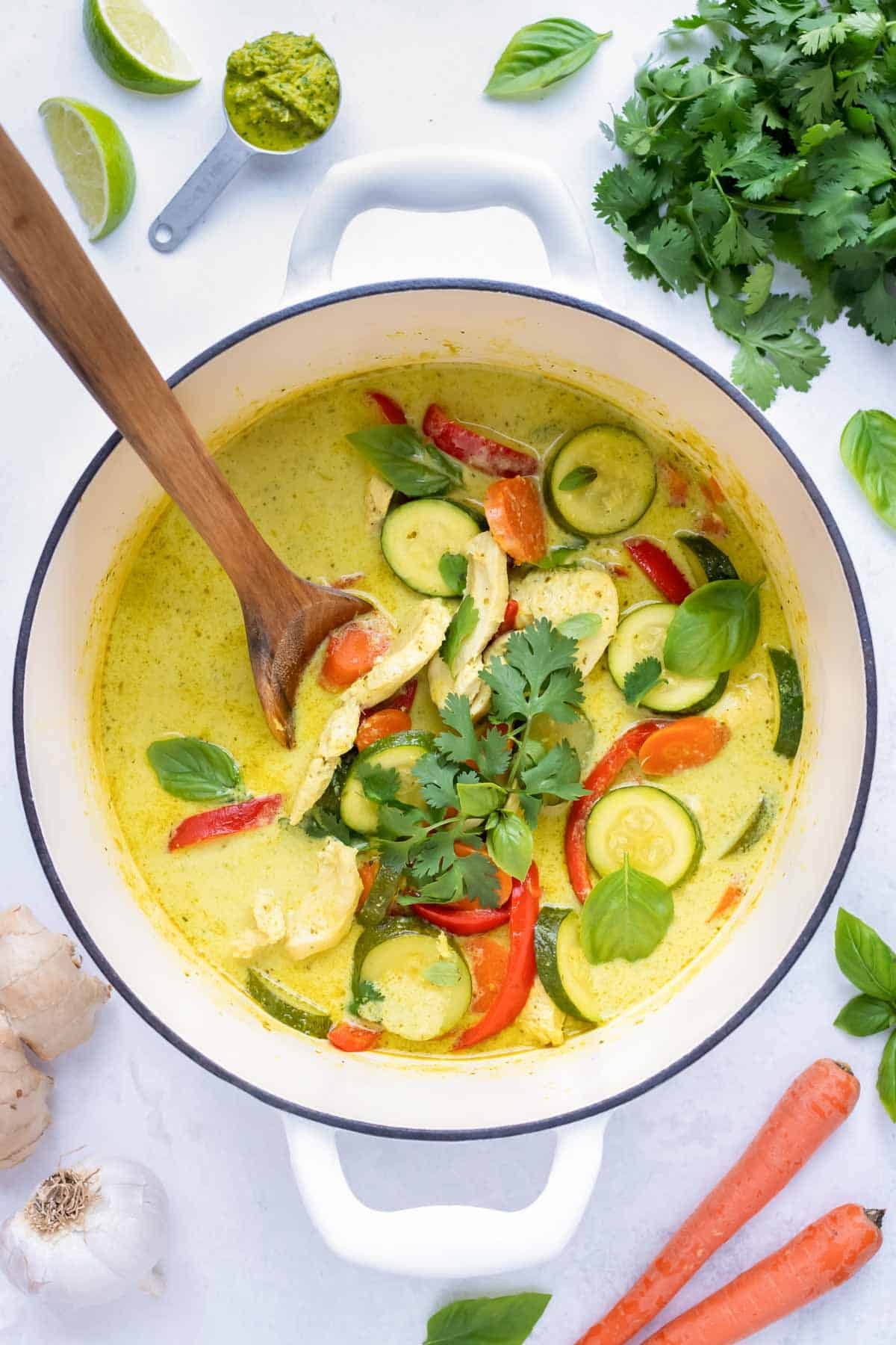 This spicy Thai Green Chicken Curry is made in a dutch oven on the stove.