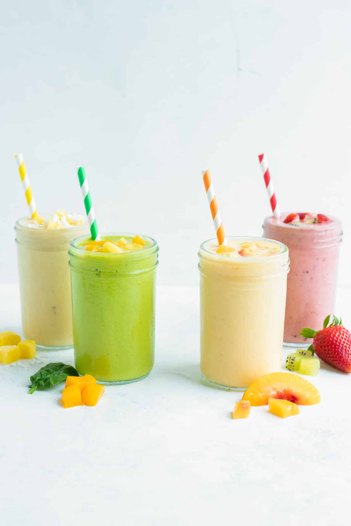 Different fruit smoothies are made and from frozen and fresh fruit.