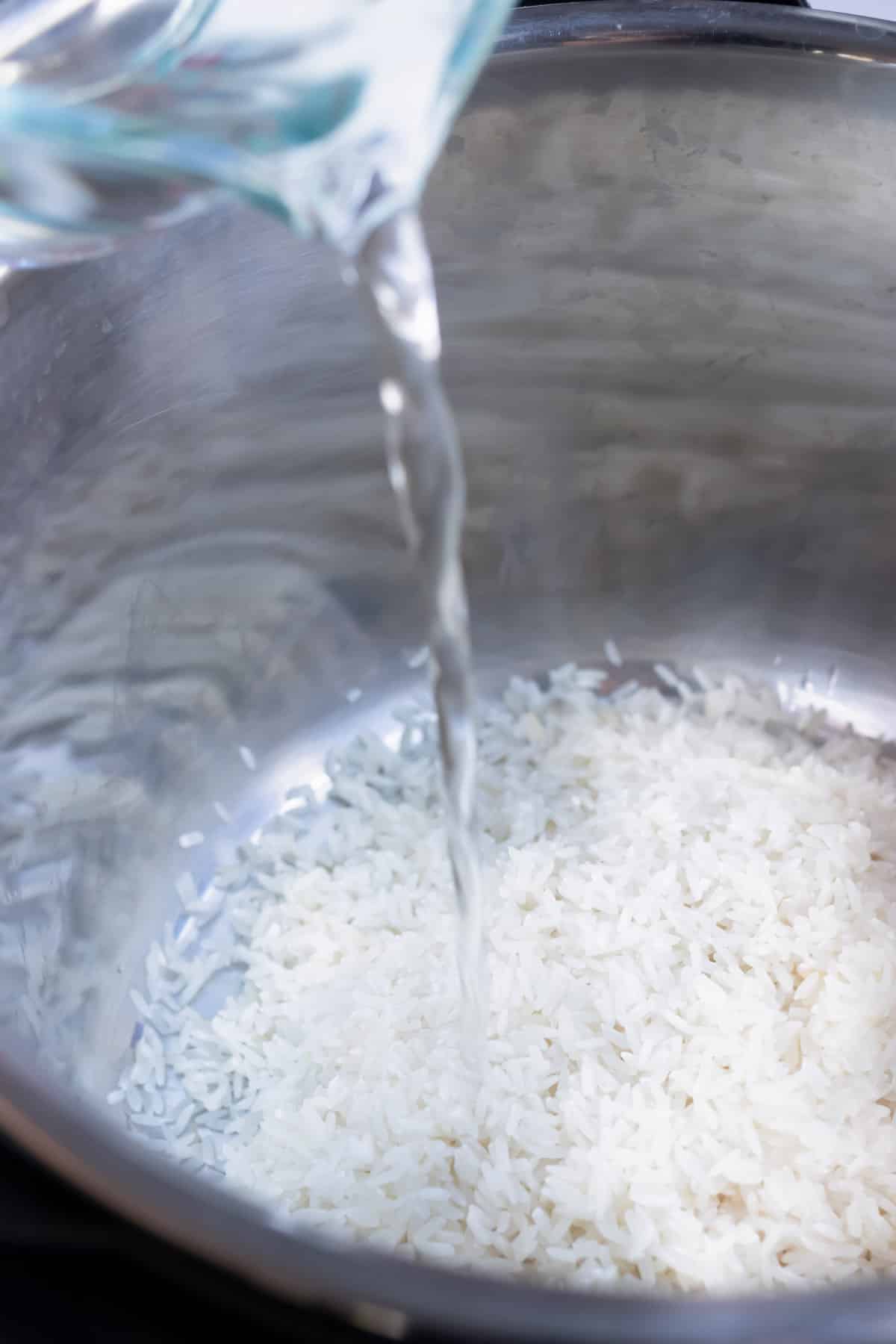 Add liquids to your rinsed rice in the instant pot for this recipe.