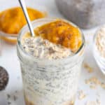 Cold overnight oats served with pumpkin puree and whipped cream.