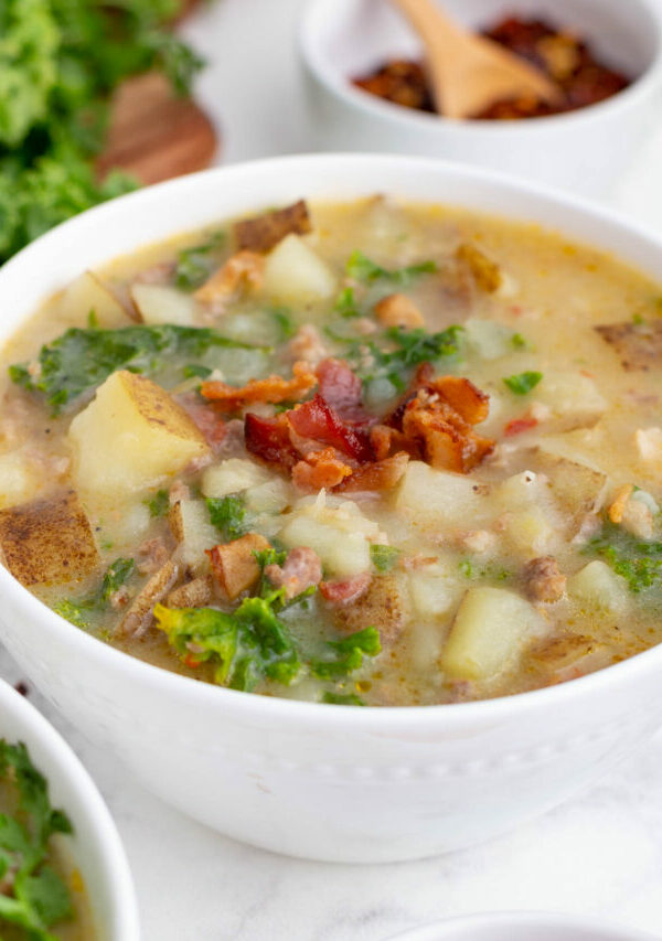 A closeup of a bowl with Zuppa Toscana.