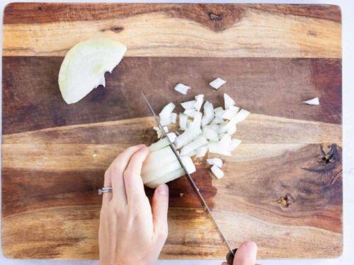Onion slices are diced into small pieces.