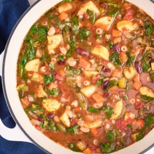 A Dutch oven full of Minestrone soup made from an Olive Garden copycat recipe.
