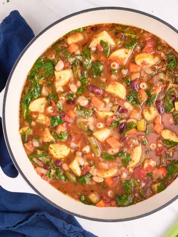 A Dutch oven full of Minestrone soup made from an Olive Garden copycat recipe.