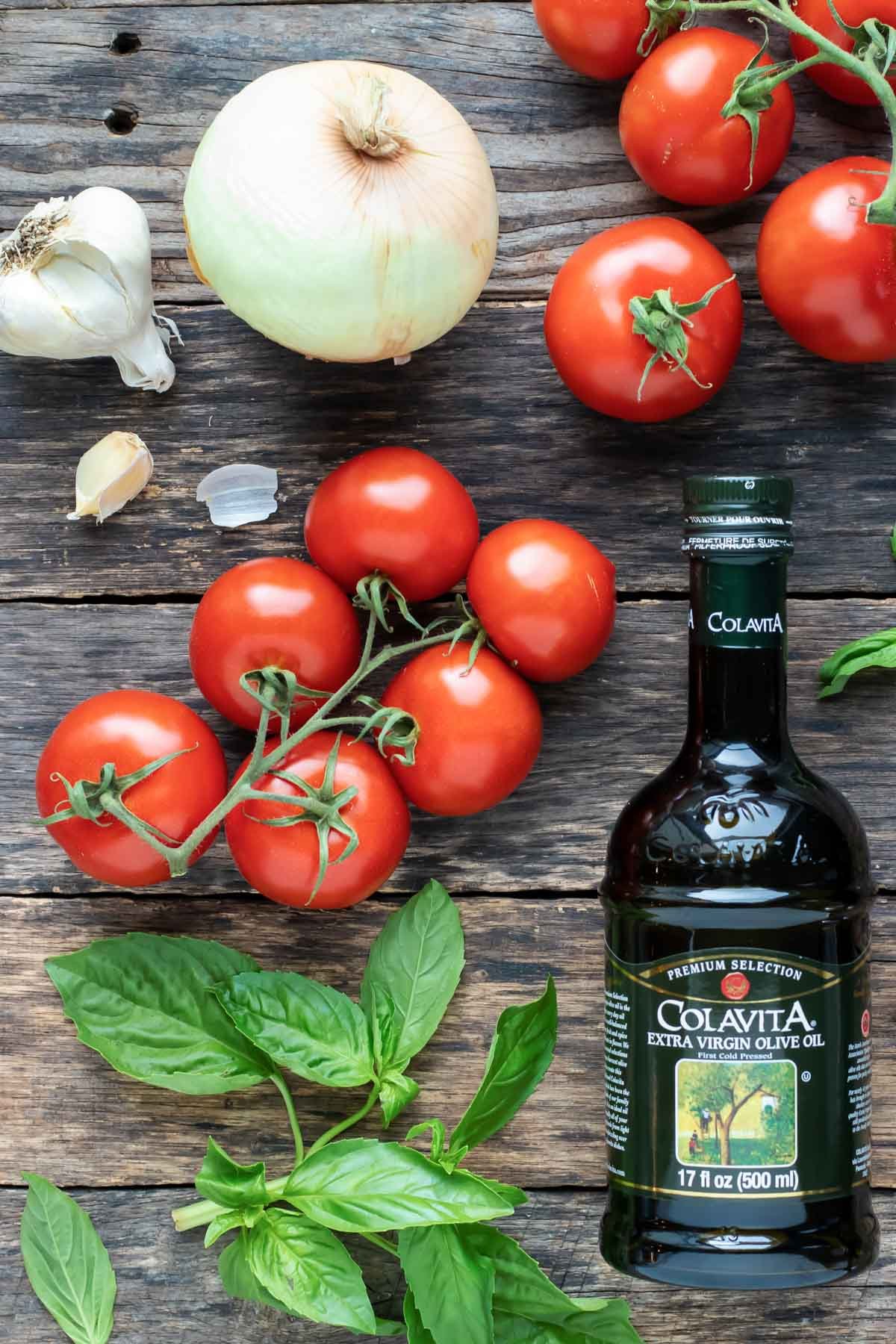 Fresh tomatoes, garlic cloves, olive oil, and fresh basil as the main ingredients in a Pomodoro sauce and a marinara sauce.