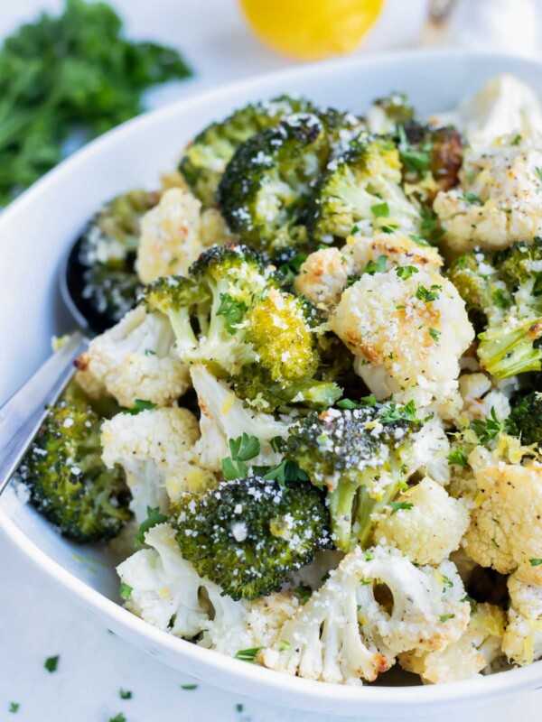 Parmesan roasted cauliflower and broccoli are a low carb vegetarian side dish.