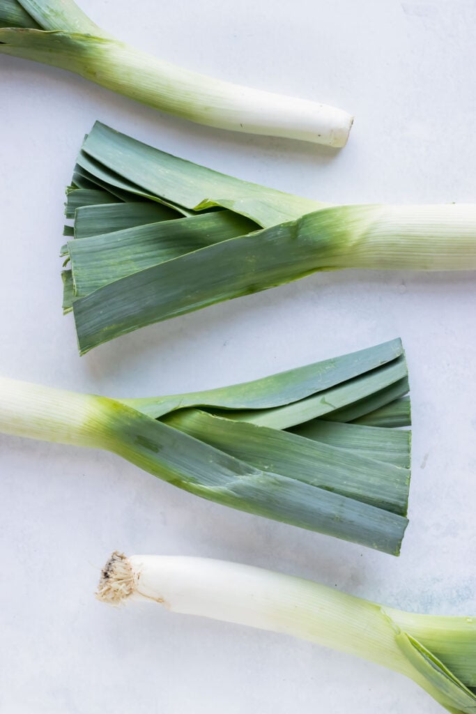 Fresh leeks for cutting and cleaning.