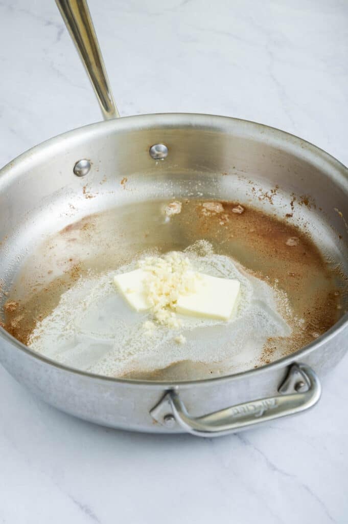 Butter is added to the pan.