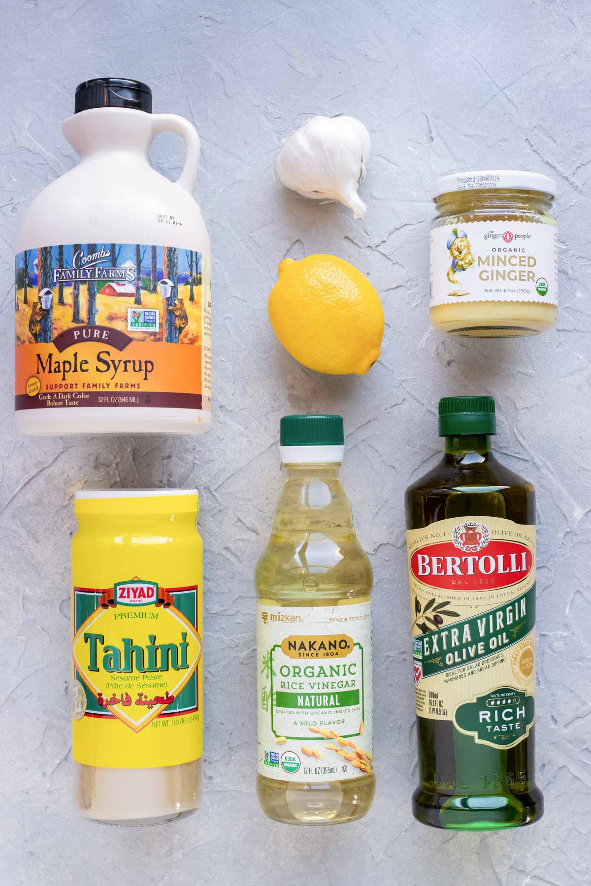 Tahini, maple syrup, lemon, garlic, olive oil, apple cider vinegar, and ginger- all the ingredients needed for lemon tahini dressing