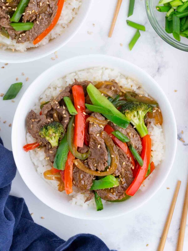 An overhead shot of beef stir fry with rice.