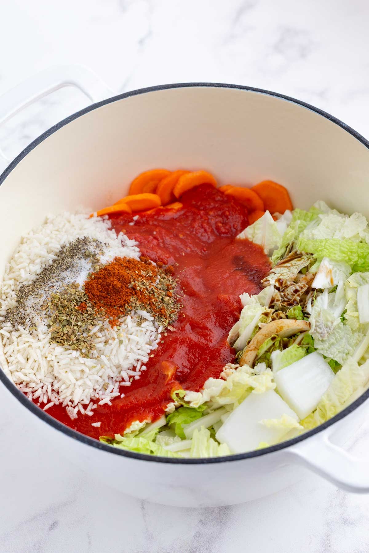 Seasonings are added to the pot.