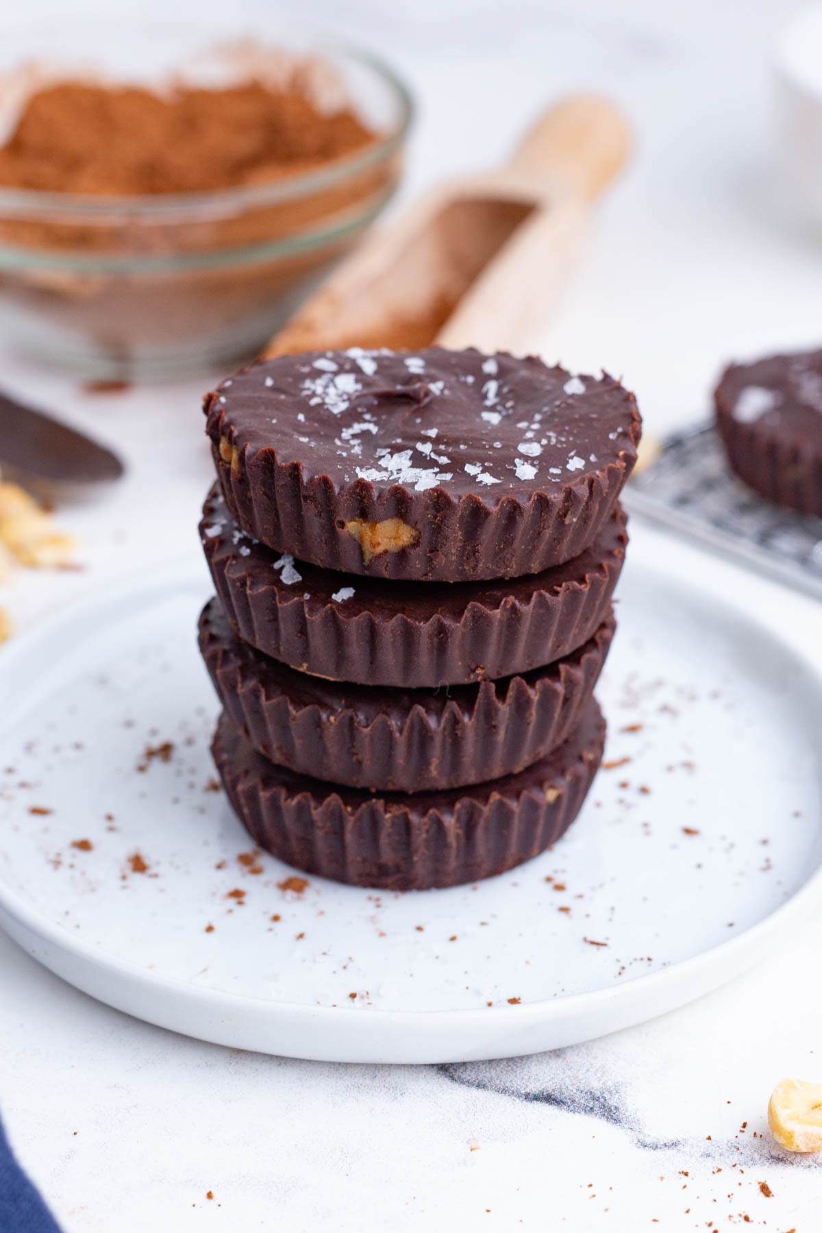 Chocolate peanut butter cups are topped with course salt.