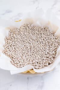 Dry beans help when par-baking a pie crust.